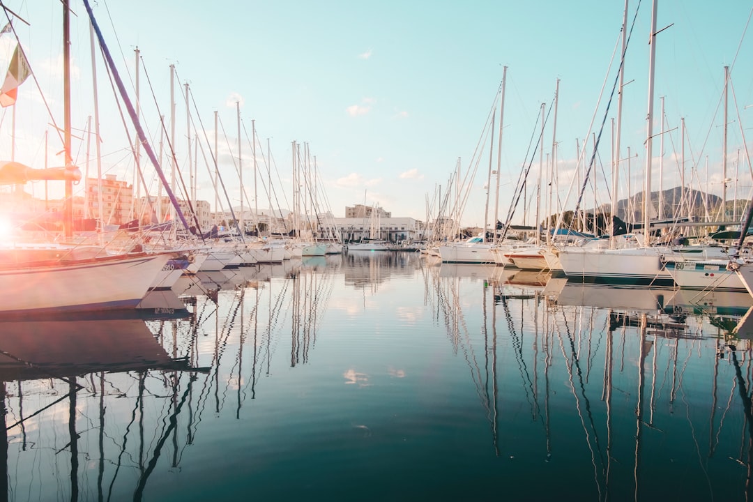 white-sailboat-in-body-of-water-during-daytime-qpnpxcqfdla