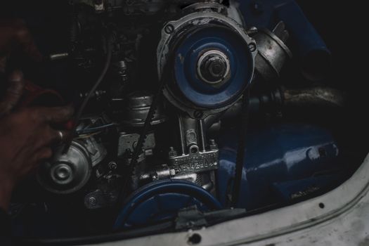Detailed view of an old car engine showcasing mechanical intricacies, located in Johannesburg.
